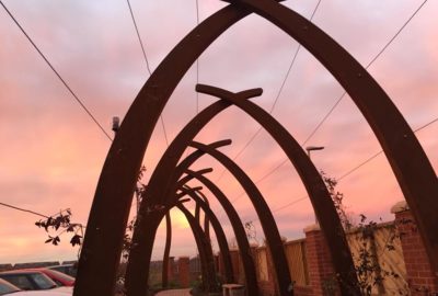 Garden arches at sunset
